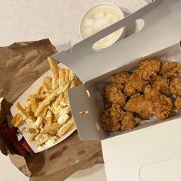 a box of fried chicken and fries