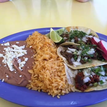 La Paloma Taqueria - Taco plate - 3 tacos, choice of meat, with rice and beans. $6.50 - Mexican Near Me - Plano, Texas