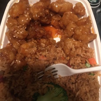 Wok N Roll - a plate of food with rice and broccoli - Chinese Near Me - Gainesville, Florida Wok N Roll - a plate of food with rice and broccoli - Chinese Near Me - Gainesville, Florida