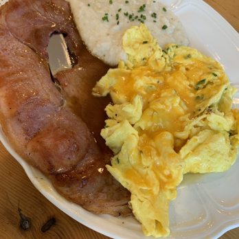 Roux Diner - Ham steak, scrambled eggs with cheddar cheese and grits. The only other cheese option was American. - Breakfast & Brunch Near Me - Chicago, Illinois Roux Diner - Ham steak, scrambled eggs with cheddar cheese and grits. The only other cheese option was American. - Breakfast & Brunch Near Me - Chicago, Illinois