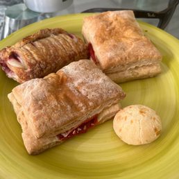 a plate of pastries and a biscuit