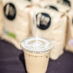 a cup of iced coffee with a straw a cup of iced coffee with a straw