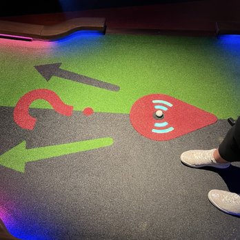 Puttshack - Nashville - How you start each round: by placing your tagged ball on the marker - Mini Golf Near Me - Nashville, Tennessee