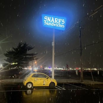 Snarf's Fenton - a yellow car parked in a parking lot - Sandwiches Near Me - Fenton, Missouri Snarf's Fenton - a yellow car parked in a parking lot - Sandwiches Near Me - Fenton, Missouri