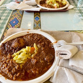 Zemeta Ethiopian Restaurant - Doro Wet, Ye Beg Wet, Lentils, Potatoes, Cabbage, and Injera. - Ethiopian Near Me - Rochester, New York Zemeta Ethiopian Restaurant - Doro Wet, Ye Beg Wet, Lentils, Potatoes, Cabbage, and Injera. - Ethiopian Near Me - Rochester, New York