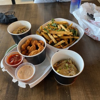 Gu's Dumplings - Szechuan Spicy Popcorn Chicken Szechuan French Fries pork & chicken dumplings. - Szechuan Near Me - Alpharetta, Georgia Gu's Dumplings - Szechuan Spicy Popcorn Chicken Szechuan French Fries pork & chicken dumplings. - Szechuan Near Me - Alpharetta, Georgia