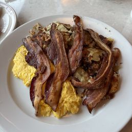 This is two eggs scrambled, and one order of bacon colossal This is two eggs scrambled, and one order of bacon colossal