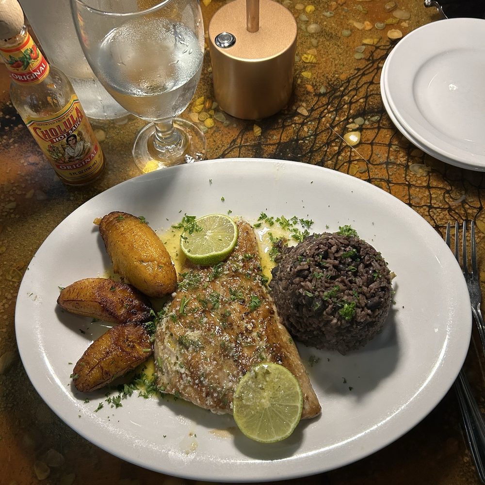 Grilled Florida Red Snapper Fillet with fried sweet plantains and rice & beans Grilled Florida Red Snapper Fillet with fried sweet plantains and rice & beans