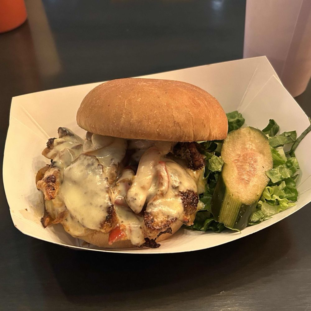 Tiki Grill - Spicy Grilled Chicken Melt Sandwich - Comfort Food Near Me - Flagstaff, Arizona Tiki Grill - Spicy Grilled Chicken Melt Sandwich - Comfort Food Near Me - Flagstaff, Arizona
