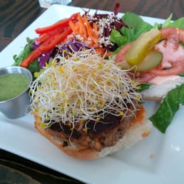 The Ultimate Burger - tempeh and black bean patty, sprouts, lettuce and tomato, pickle, chipotle mayo.