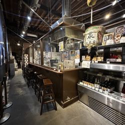 Izumi Ontario Spring Water Sake Company - Additional seating, distillery views, and goods for purchase
