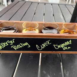 Wine flight (my own choices - all across the board). They also have suggested flights. Wine flight (my own choices - all across the board). They also have suggested flights.