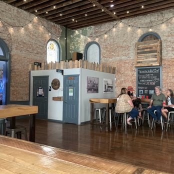 3rd Turn Brewing - a group of people sitting at tables - Breweries Near Me - Louisville, Kentucky