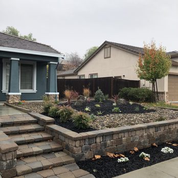 Streamline Landscape - AFTER: Added dark landscape material to soften the hard scape. Created a berm to elevate and create visual interest. - Masonry/Concrete Near Me - Vacaville, California Streamline Landscape - AFTER: Added dark landscape material to soften the hard scape. Created a berm to elevate and create visual interest. - Masonry/Concrete Near Me - Vacaville, California