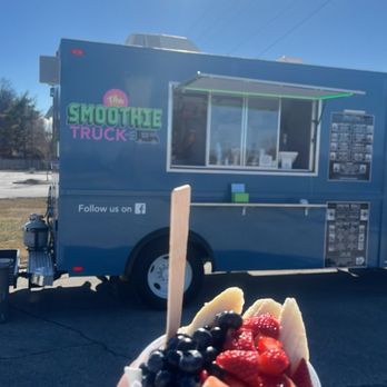 The Smoothie Truck - a person holding a bowl of fruit - Food Trucks Near Me - Papillion, Nebraska The Smoothie Truck - a person holding a bowl of fruit - Food Trucks Near Me - Papillion, Nebraska