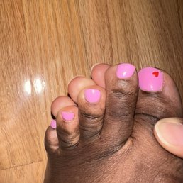Uneven 'trim' of my nails. Also super thick after a bunch of layered polish. Uneven 'trim' of my nails. Also super thick after a bunch of layered polish.