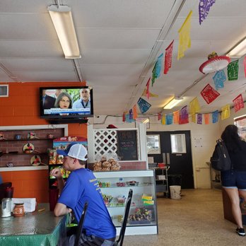 Restaurante Los 3 Hermanos - a man sitting at a table - Mexican Near Me - Davenport, Florida Restaurante Los 3 Hermanos - a man sitting at a table - Mexican Near Me - Davenport, Florida