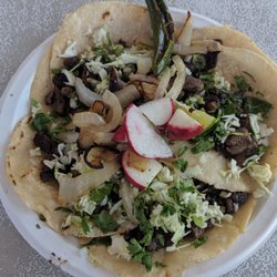 Taqueria Luna - Tacos de asada on fresh tortillas. So good!