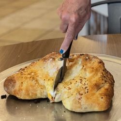 Sebastiano's Pizzeria - Meal Lovers Calzone.