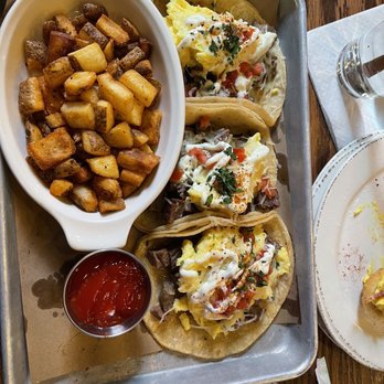 The Oakmont - Breakfast tacos with breakfast potatoes on side - American Near Me - Indianapolis, Indiana The Oakmont - Breakfast tacos with breakfast potatoes on side - American Near Me - Indianapolis, Indiana
