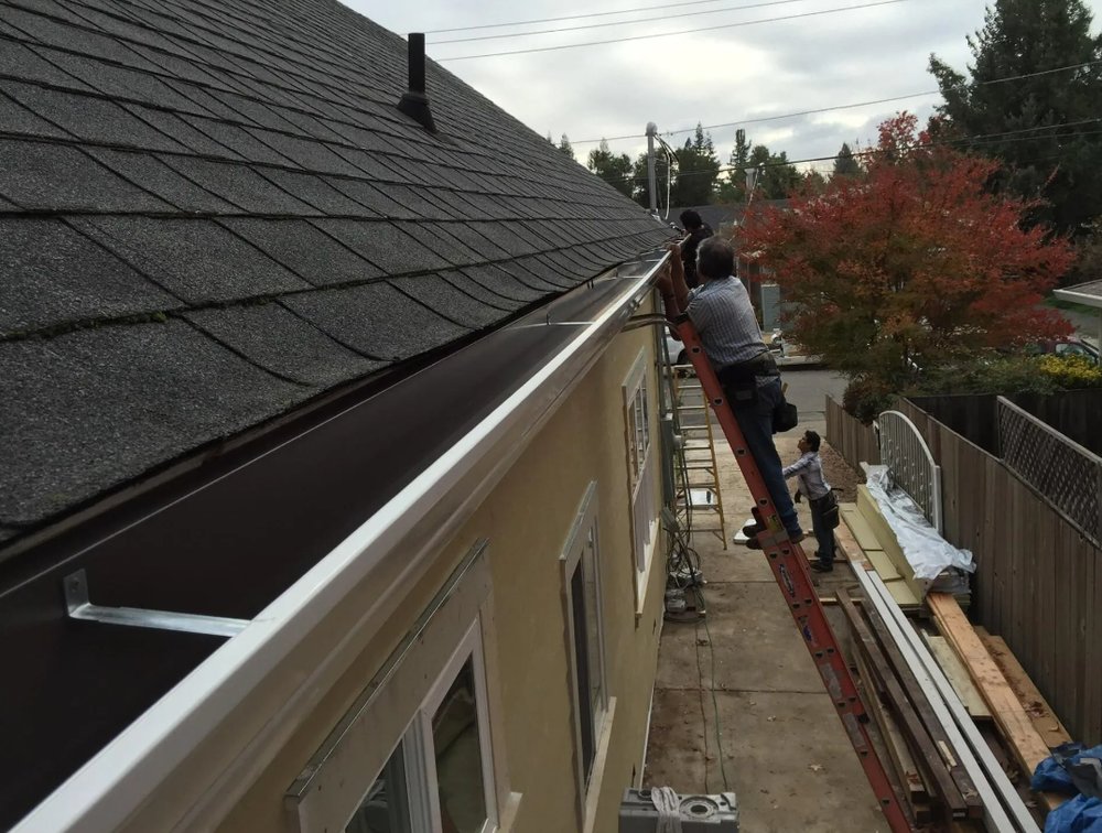 Slide of Titan Roofing and Construction