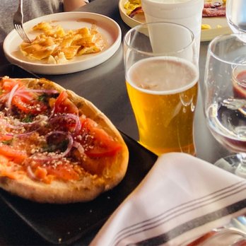The Front Yard - Brunch flatbread with smoked salmon tomato red onion and caper cream cheese - Beer Gardens Near Me - Las Vegas, Nevada The Front Yard - Brunch flatbread with smoked salmon tomato red onion and caper cream cheese - Beer Gardens Near Me - Las Vegas, Nevada