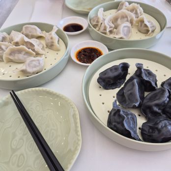 Baohaus - Left chicken/ mushroom dumpling, top lamb/leek dumpling, &right pork/ shrimp dumpling - Dumplings Near Me - Burnaby, British Columbia Baohaus - Left chicken/ mushroom dumpling, top lamb/leek dumpling, &right pork/ shrimp dumpling - Dumplings Near Me - Burnaby, British Columbia