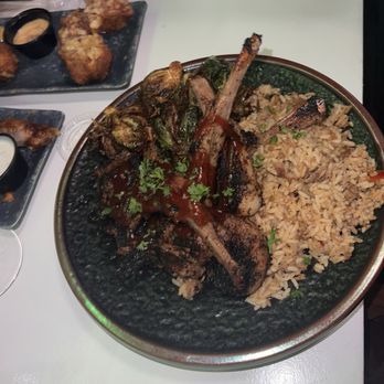 Peachez - Lamb over dirty rice with Brussels sprouts. - Lounges Near Me - Houston, Texas Peachez - Lamb over dirty rice with Brussels sprouts. - Lounges Near Me - Houston, Texas