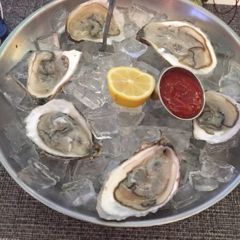 The Happy Clam - Half dozen oysters for $18. They were really tasty but not sure where they were from. - Airport Lounges Near Me - Newark, New Jersey The Happy Clam - Half dozen oysters for $18. They were really tasty but not sure where they were from. - Airport Lounges Near Me - Newark, New Jersey