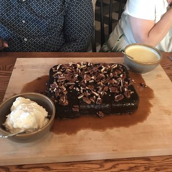 Whiskey Cake - Full whiskey cake, whipped cream and a brandy sauce. - New American Near Me - Plano, Texas Whiskey Cake - Full whiskey cake, whipped cream and a brandy sauce. - New American Near Me - Plano, Texas