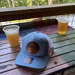 Gad Dam Brewing - Two beers and a hat.
