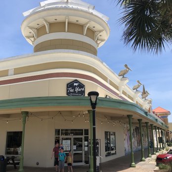 The Yard Milkshake Bar - We loved the pelicans statues on top of the building - Ice Cream & Frozen Yogurt Near Me - Gulf Shores, Alabama The Yard Milkshake Bar - We loved the pelicans statues on top of the building - Ice Cream & Frozen Yogurt Near Me - Gulf Shores, Alabama