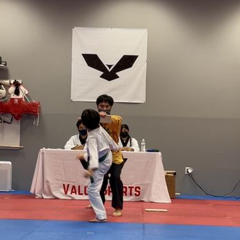 Valor Sports - Breaking board at promotion test - Taekwondo Near Me - Milpitas, California Valor Sports - Breaking board at promotion test - Taekwondo Near Me - Milpitas, California