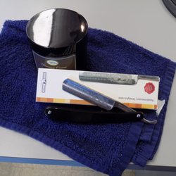 Bennetts Corners Barber Shop - Our straight razor shave uses thick oud lather and a German Golddachs razor for an extremely close finish