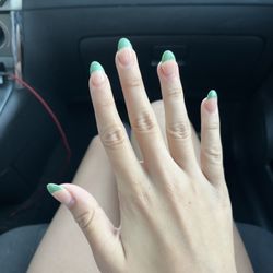Bellagio Nail Spa - They are really grown out, but they were bumpy, crooked, and with air bubbles. The lady who did them was in a rush