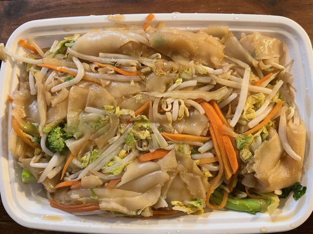 New Taste Chinese Take-Out Logo