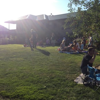 Suncrest Gardens Pizza Farm - People on their blankets - Pizza Near Me - Cochrane, Wisconsin Suncrest Gardens Pizza Farm - People on their blankets - Pizza Near Me - Cochrane, Wisconsin