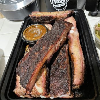 My Father's BBQ - Half slab smoked ribs with delicious barbecue sauce on the side - Southern Near Me - Carson, California My Father's BBQ - Half slab smoked ribs with delicious barbecue sauce on the side - Southern Near Me - Carson, California