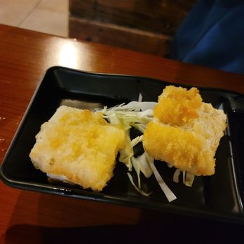 Edo Japan - Agadashi tofu. Top half is coated. - Japanese Near Me - Houston, Texas Edo Japan - Agadashi tofu. Top half is coated. - Japanese Near Me - Houston, Texas