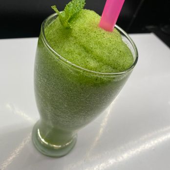 Mazaj Lounge - a green smoothie with a pink straw - Lounges Near Me - Milton, Ontario