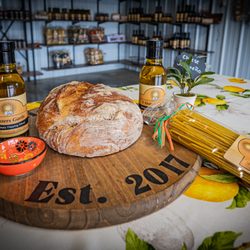 3 Sisters Garlic - Dipping Oil's along with fresh Italian Breads, Pastas and dipping bowls.