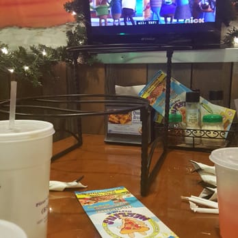 Merlins Pizza - Tv in booth - Pizza Near Me - Destin, Florida Merlins Pizza - Tv in booth - Pizza Near Me - Destin, Florida