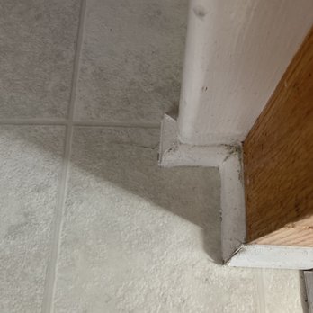 American Dream Flooring & Tile - Glue in floor tear placed by first repairman. - Flooring Near Me - Raleigh, North Carolina American Dream Flooring & Tile - Glue in floor tear placed by first repairman. - Flooring Near Me - Raleigh, North Carolina