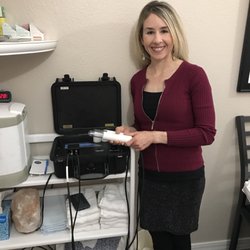 Savvy Wellness - Sheree with Lymphatic Drainage equipment.