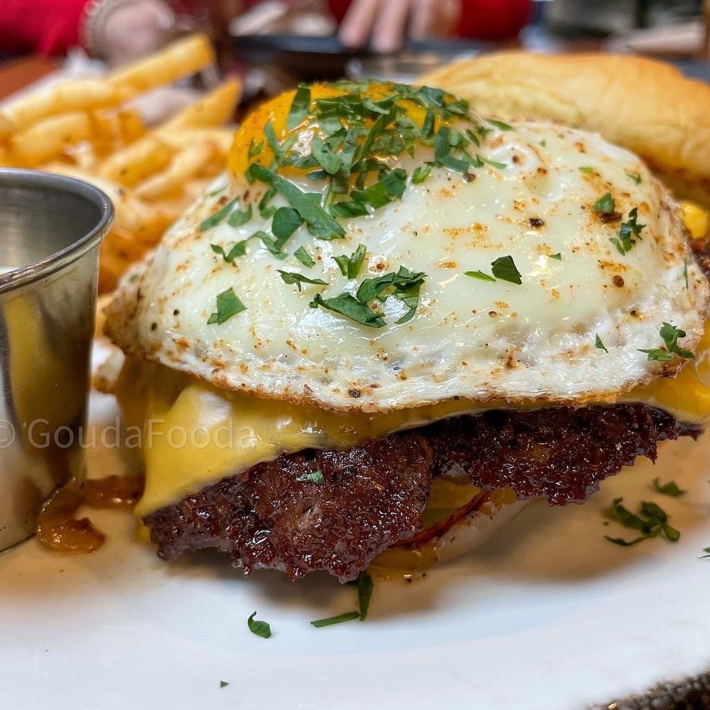 Cinderlands Warehouse - Smashed Wagyu Burger  Griddled Onion / Dijonnaise / American Cheese / Bread & Butter Pickles / House-Made Potato Roll from Baker Ben Martin - Breweries Near Me - Pittsburgh, Pennsylvania
