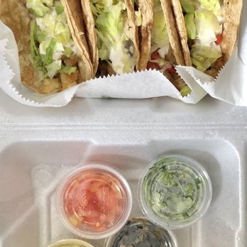 La Divina Tacos - La Divina four vegetarian tacos and assorted toppings. - Mexican Near Me - Buffalo, New York