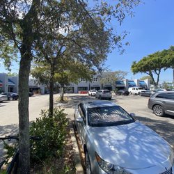 Shoppes of Wilton Manors - Many tress shade the parking lot.