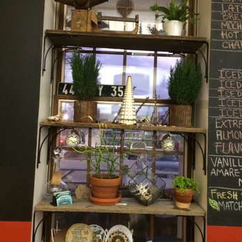 Aesop's Tables Cafe - a display of plants and dishes - Cafes Near Me - Peterborough, New Hampshire