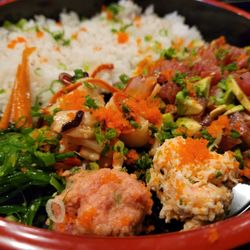 Ahi Sushi Bar & Grill - Poke bowl. This has a calamari salad, seafood salad, crab salad along with the poke and rice. It's a very generous portion and delicious!