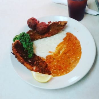 Dixie Grill - Pecan-encrusted catfish and grits. - Southern Near Me - Live Oak, Florida